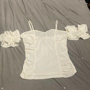 Cute white top with ruffled arm sleeves